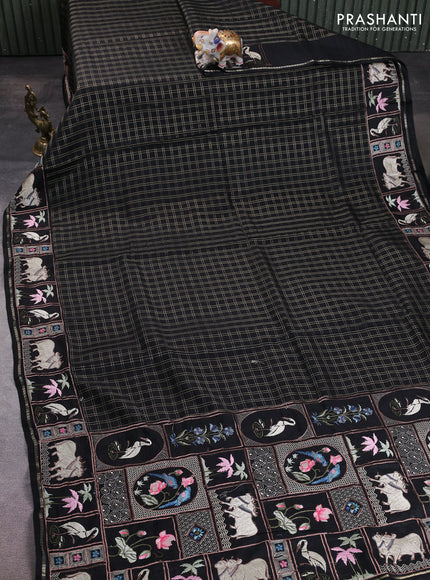 Semi tussar saree black with allover zari checked pattern and pihwai embroidery border
