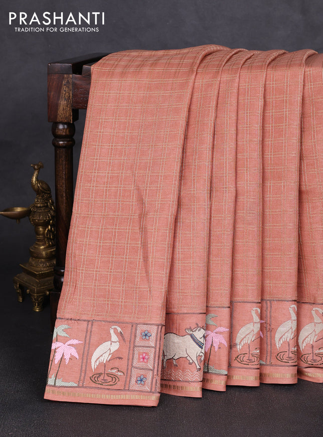 Semi tussar saree peach shade with allover zari checked pattern and pihwai embroidery border
