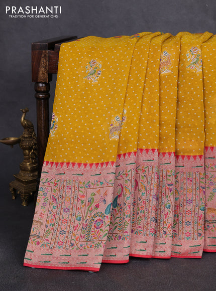 Banarasi georgette saree mustard yellow with allover bhandhani prints & meenakari buttas and long meenakari border