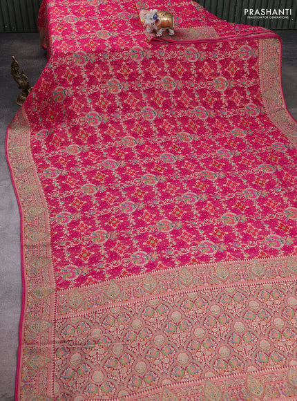 Banarasi georgette saree pink with allover bandhani prints & meenakari weaves and long meenakari border