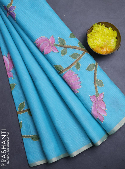 Kota saree turquoise with allover hand paints & kantha stitch work and zari woven piping border