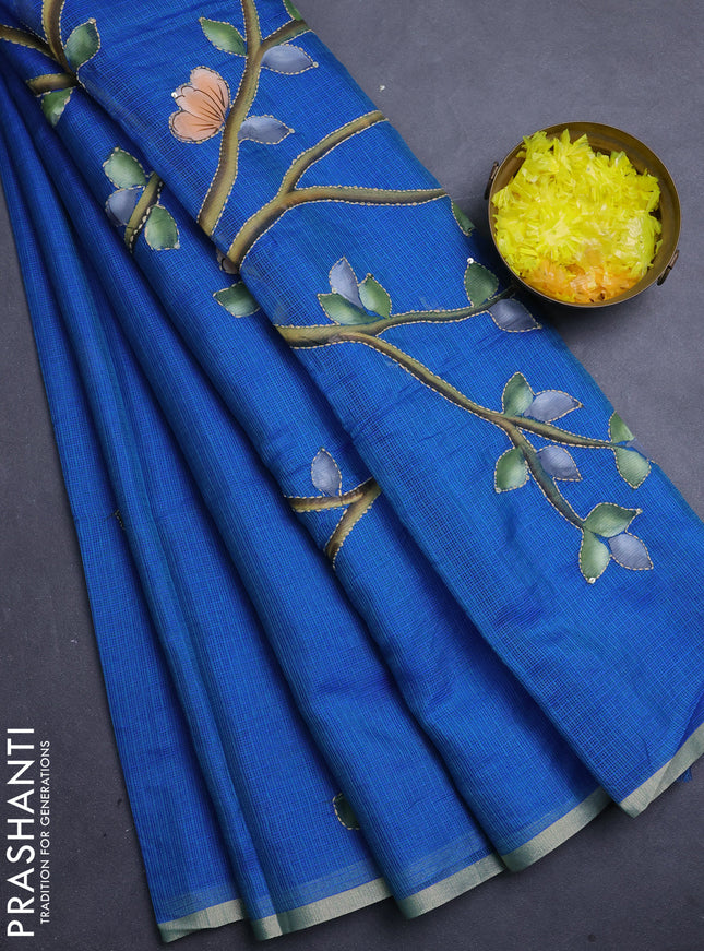 Kota saree teal blue with allover hand paints & kantha stitch work and zari woven piping border