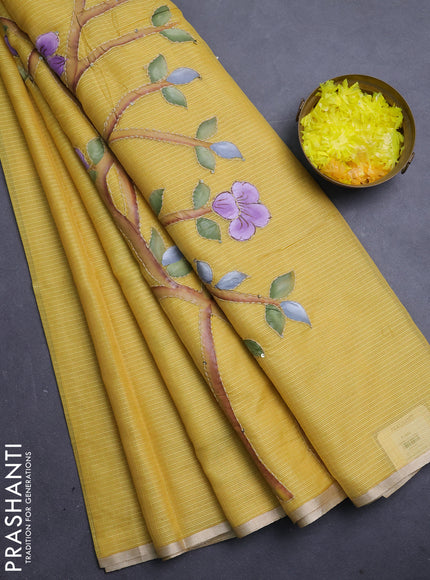 Kota saree yellow with allover hand paints & kantha stitch work and zari woven piping border