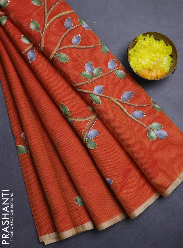 Kota saree orange with allover hand paints & kantha stitch work and zari woven piping border