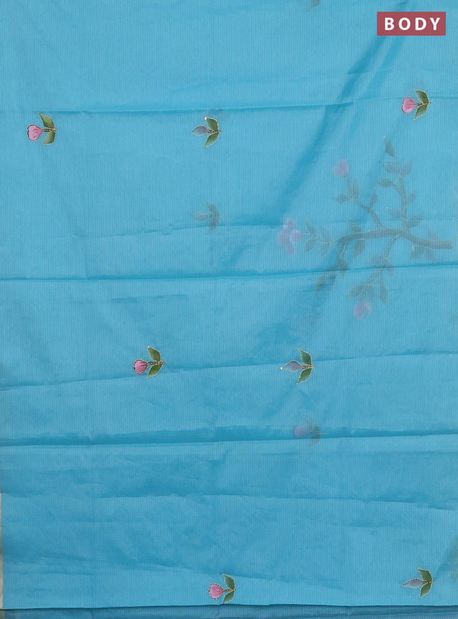 Kota saree teal blue with allover hand paints & kantha stitch work and zari woven piping border