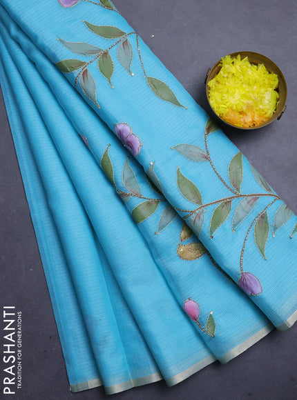 Kota saree turquoise with allover hand paints & kantha stitch work and zari woven piping border