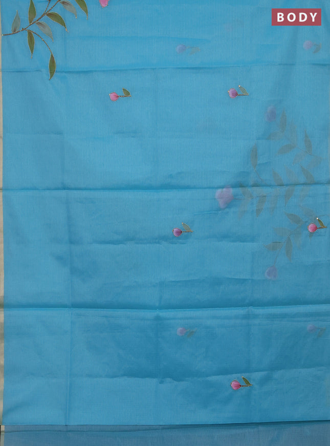 Kota saree turquoise with allover hand paints & kantha stitch work and zari woven piping border