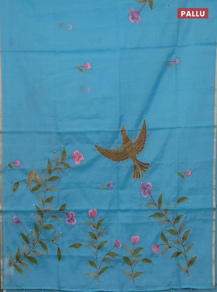 Kota saree turquoise with allover hand paints & kantha stitch work and zari woven piping border