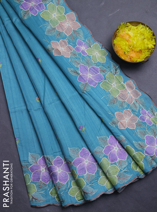Semi raw silk saree teal blue with embroidery buttas and floral embroidery border