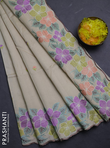 Semi raw silk saree beige with embroidery buttas and floral embroidery border