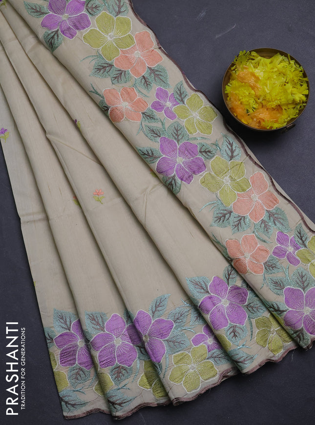 Semi raw silk saree beige with embroidery buttas and floral embroidery border