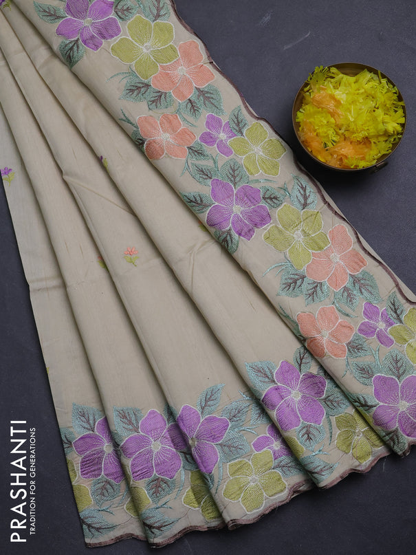 Semi raw silk saree beige with embroidery buttas and floral embroidery border