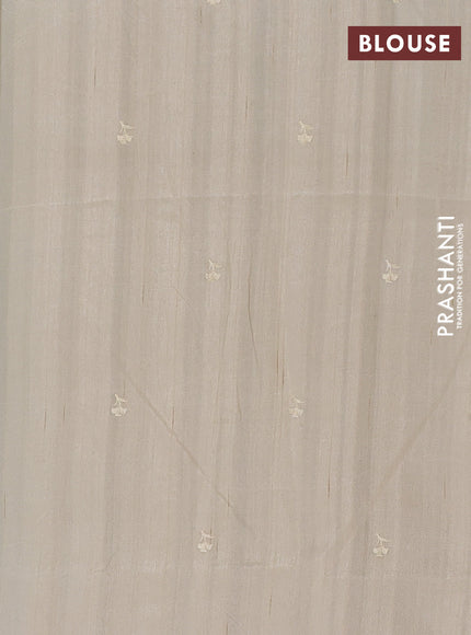 Semi raw silk saree beige with embroidery buttas and floral embroidery border