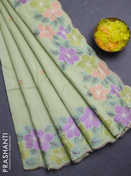 Semi raw silk saree pista green with embroidery buttas and floral embroidery border
