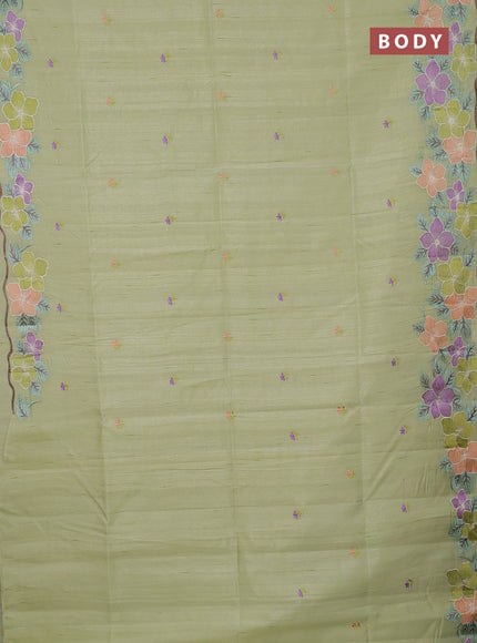 Semi raw silk saree pista green with embroidery buttas and floral embroidery border