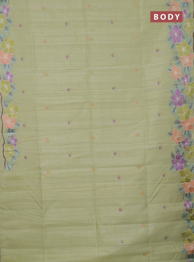 Semi raw silk saree pista green with embroidery buttas and floral embroidery border