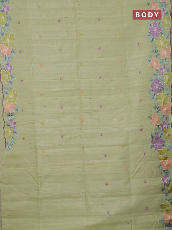 Semi raw silk saree pista green with embroidery buttas and floral embroidery border