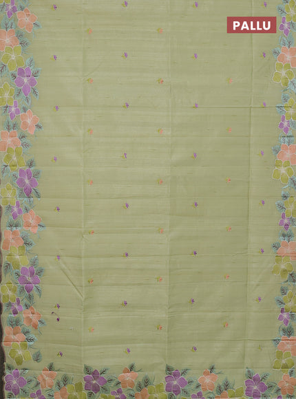 Semi raw silk saree pista green with embroidery buttas and floral embroidery border