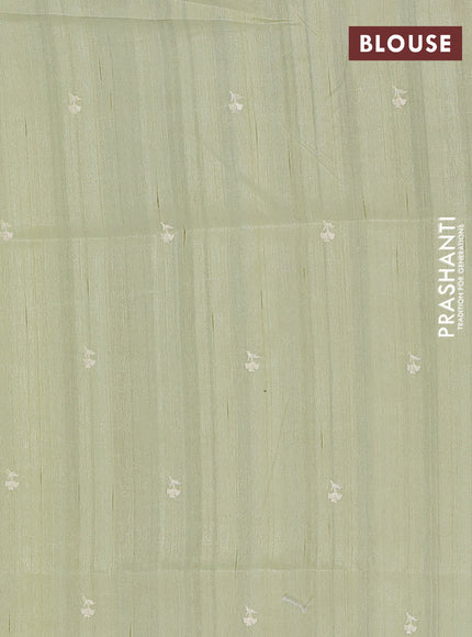 Semi raw silk saree pista green with embroidery buttas and floral embroidery border