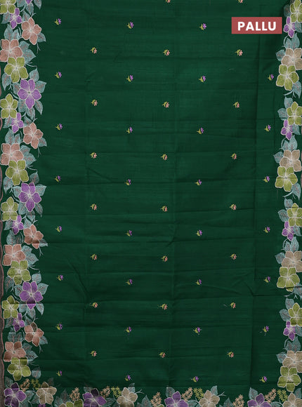 Semi raw silk saree bottle green with embroidery buttas and floral embroidery border