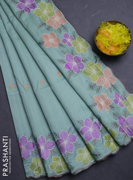 Semi raw silk saree pastel green with embroidery buttas and floral embroidery border