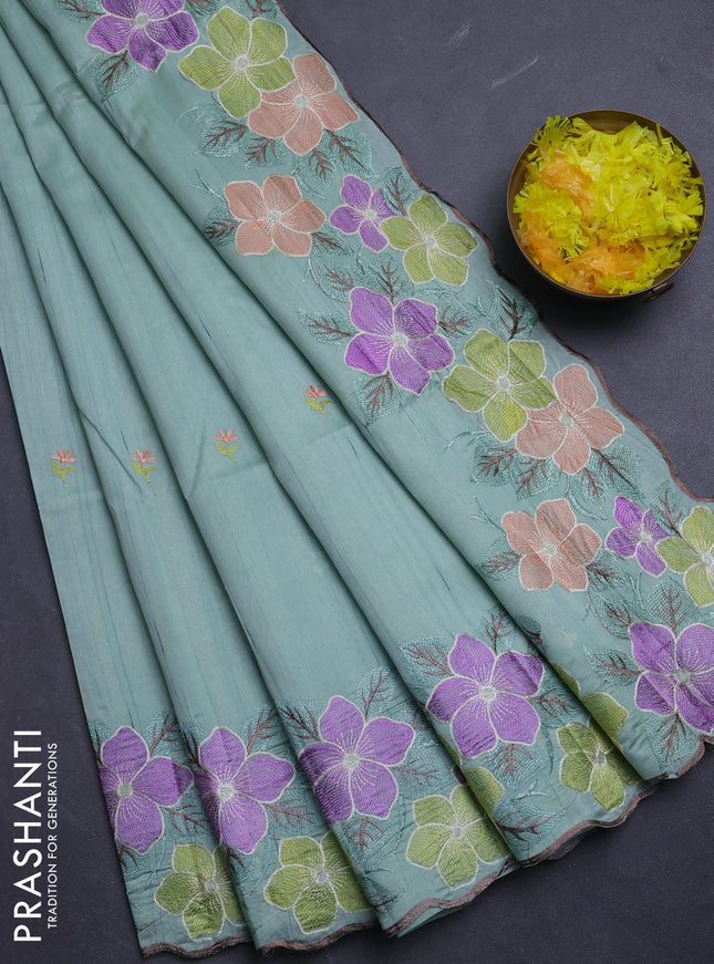 Semi raw silk saree pastel green with embroidery buttas and floral embroidery border