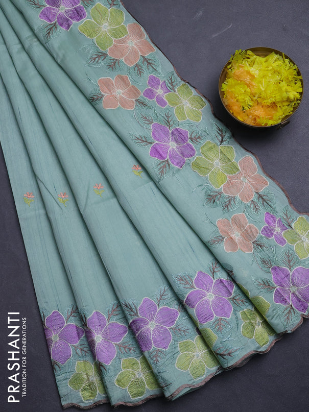 Semi raw silk saree pastel green with embroidery buttas and floral embroidery border