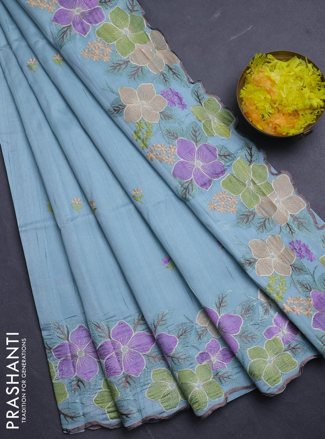Semi raw silk saree pastel blue with embroidery buttas and floral embroidery border