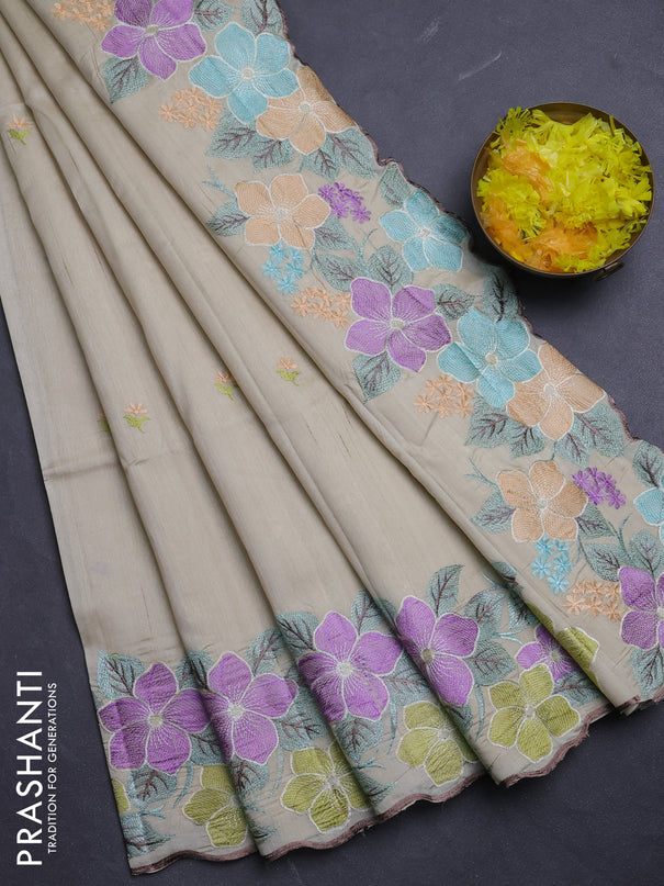 Semi raw silk saree beige with embroidery buttas and floral embroidery border