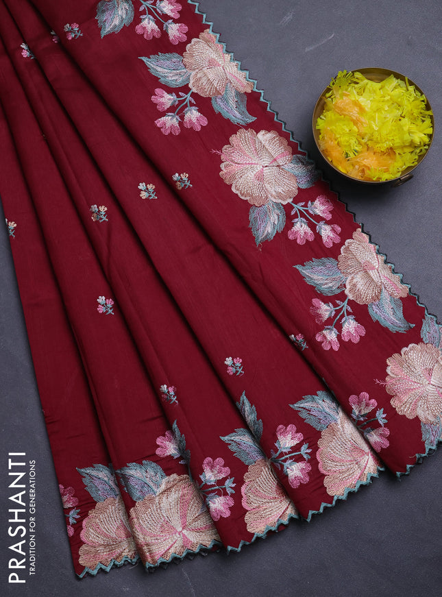 Semi raw silk saree maroon with embroidery buttas and floral embroidery border