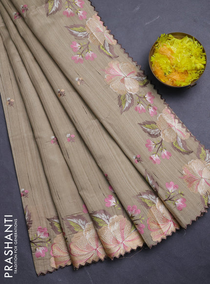 Semi raw silk saree beige with embroidery buttas and floral embroidery border