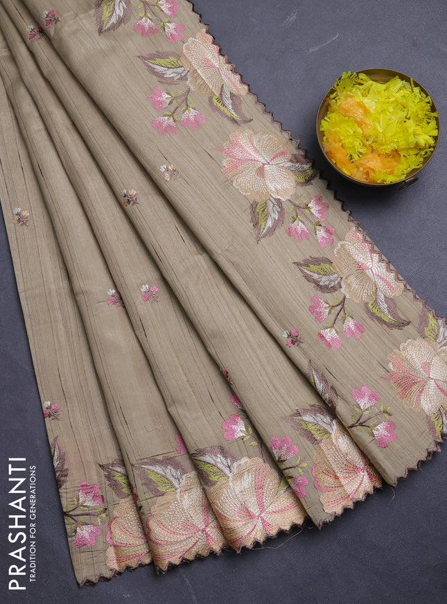 Semi raw silk saree beige with embroidery buttas and floral embroidery border