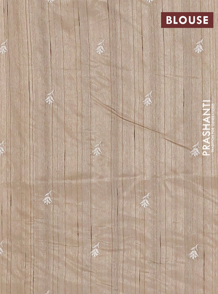 Semi raw silk saree beige with embroidery buttas and floral embroidery border