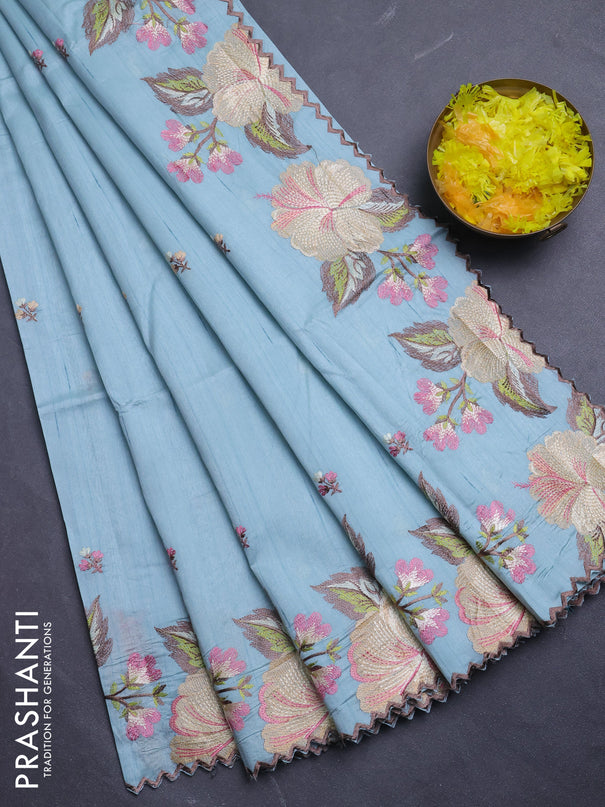 Semi raw silk saree pastel blue with embroidery buttas and floral embroidery border