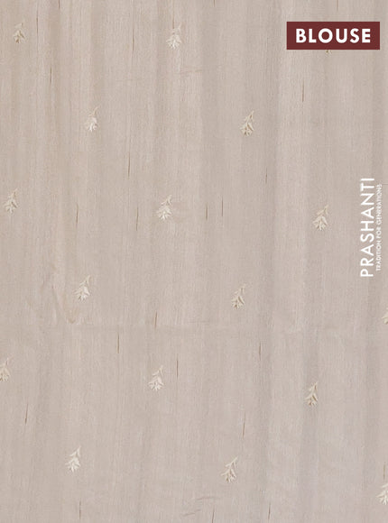 Semi raw silk saree beige with embroidery buttas and floral embroidery border