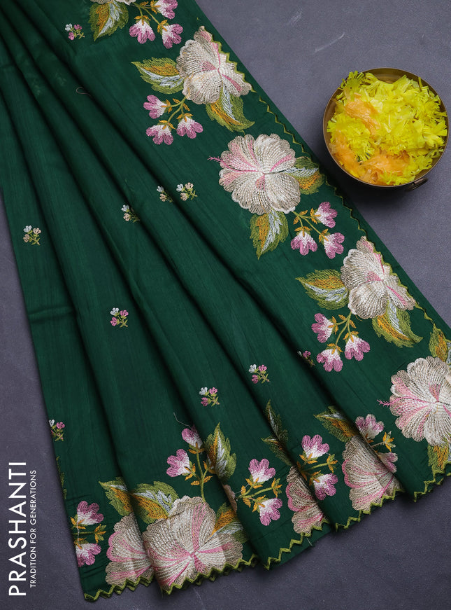 Semi raw silk saree bottle green with embroidery buttas and floral embroidery border