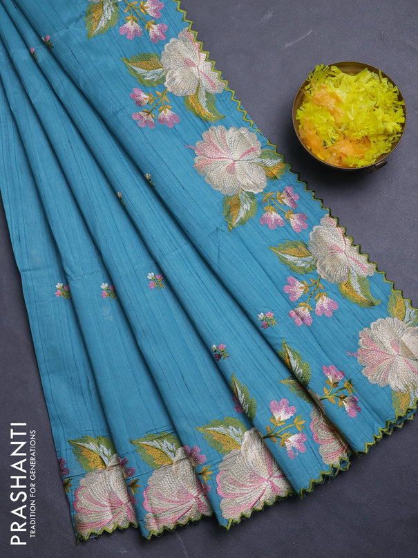 Semi raw silk saree teal blue with embroidery buttas and floral embroidery border