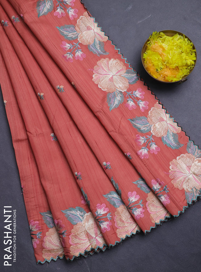 Semi raw silk saree rust shade with embroidery buttas and floral embroidery border