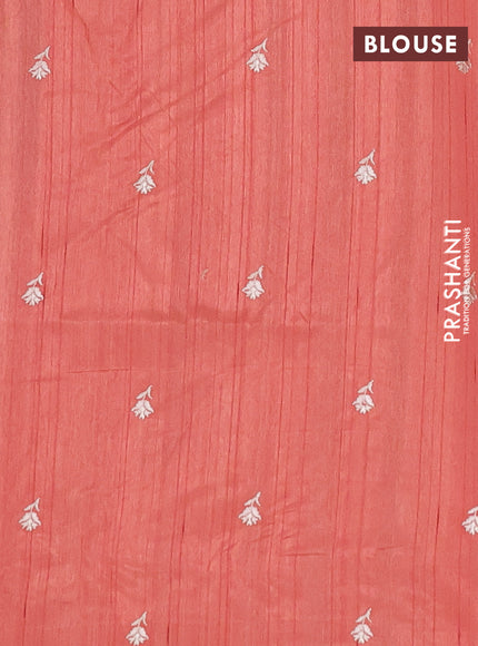 Semi raw silk saree rust shade with embroidery buttas and floral embroidery border