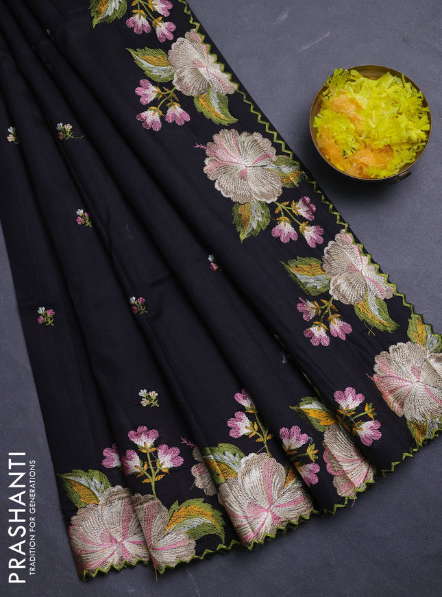 Semi raw silk saree black with embroidery buttas and floral embroidery border