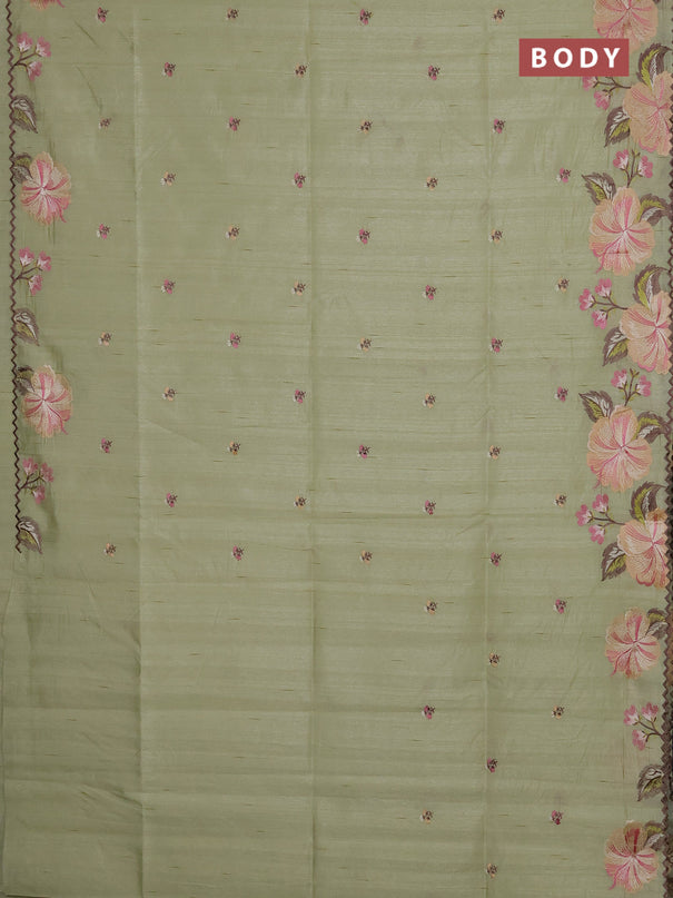 Semi raw silk saree pista green with embroidery buttas and floral embroidery border