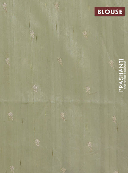 Semi raw silk saree pista green with embroidery buttas and floral embroidery border