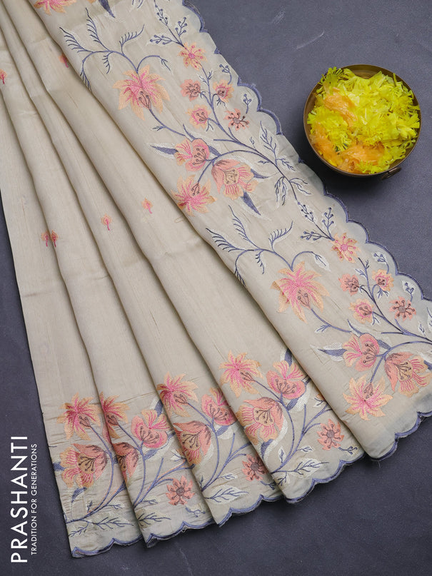 Semi raw silk saree beige with embroidery buttas and floral embroidery border