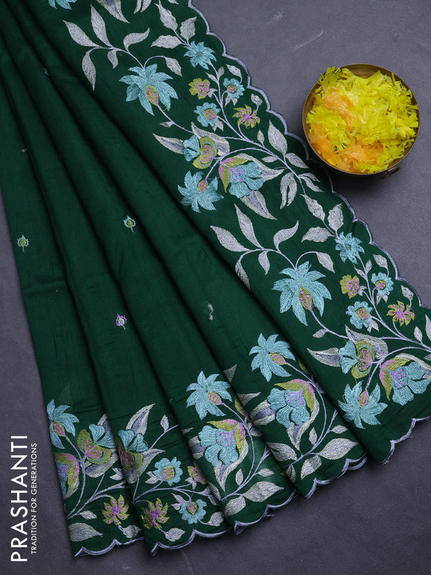 Semi raw silk saree bottle green with embroidery buttas and floral embroidery border