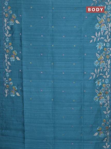 Semi raw silk saree teal blue with embroidery buttas and floral embroidery border