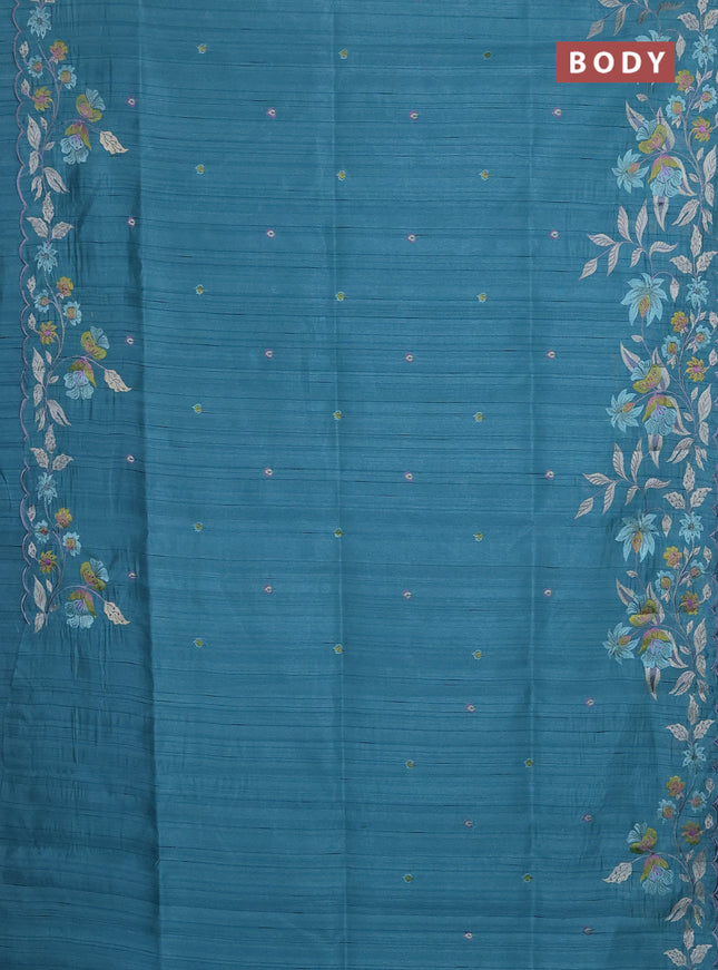 Semi raw silk saree teal blue with embroidery buttas and floral embroidery border