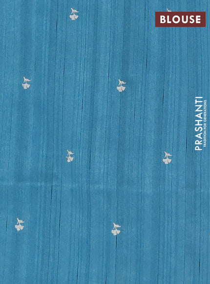 Semi raw silk saree teal blue with embroidery buttas and floral embroidery border