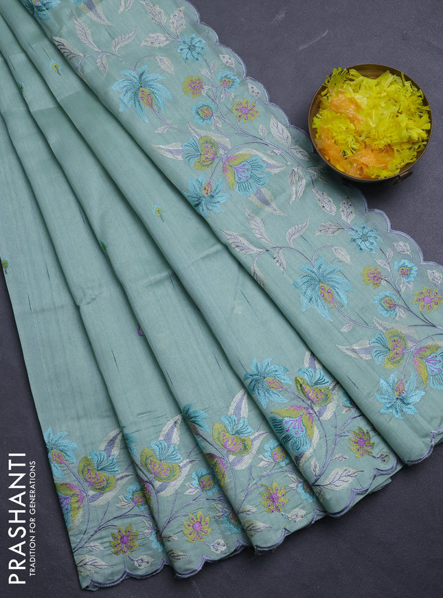 Semi raw silk saree pastel green with embroidery buttas and floral embroidery border