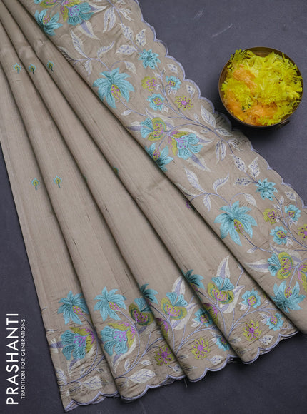 Semi raw silk saree beige with embroidery buttas and floral embroidery border