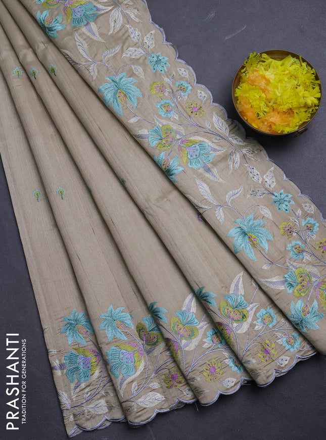 Semi raw silk saree beige with embroidery buttas and floral embroidery border
